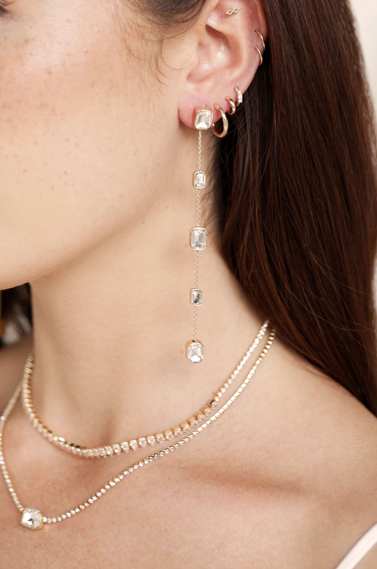 Iconic Crystal Dangle Earrings on a model
