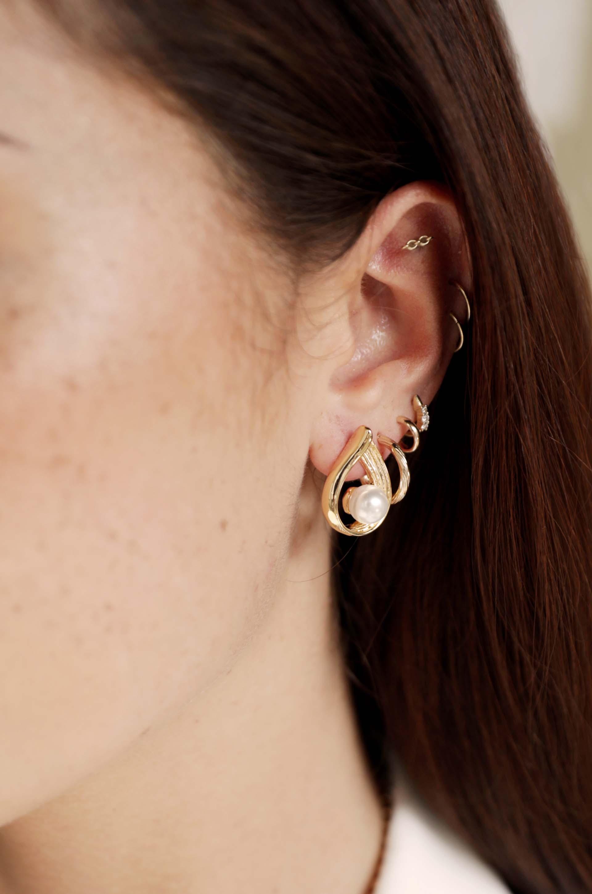 Golden Teardrop and Pearl 18k Gold Plated Earrings on a model
