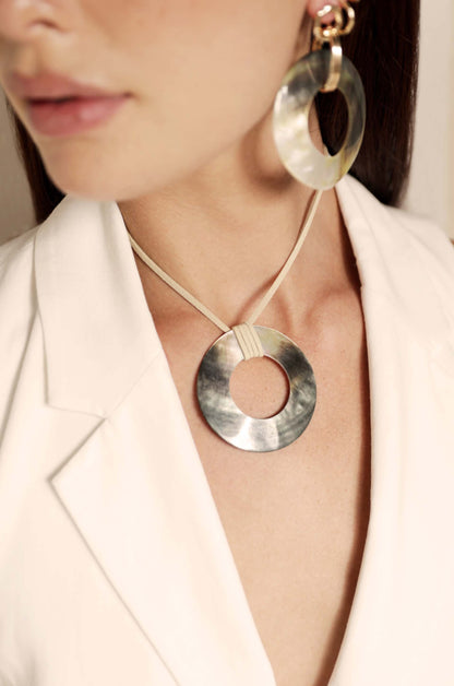 Iridescent Shell Circle Pendant Adjustable Necklace on a model