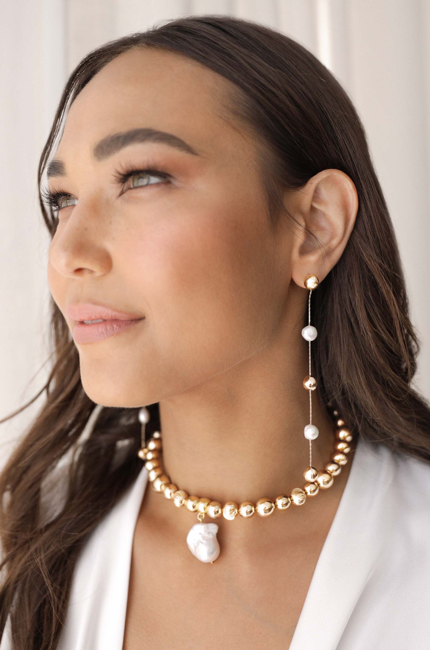 Alternating Freshwater Pearl Drop Earrings on model 2