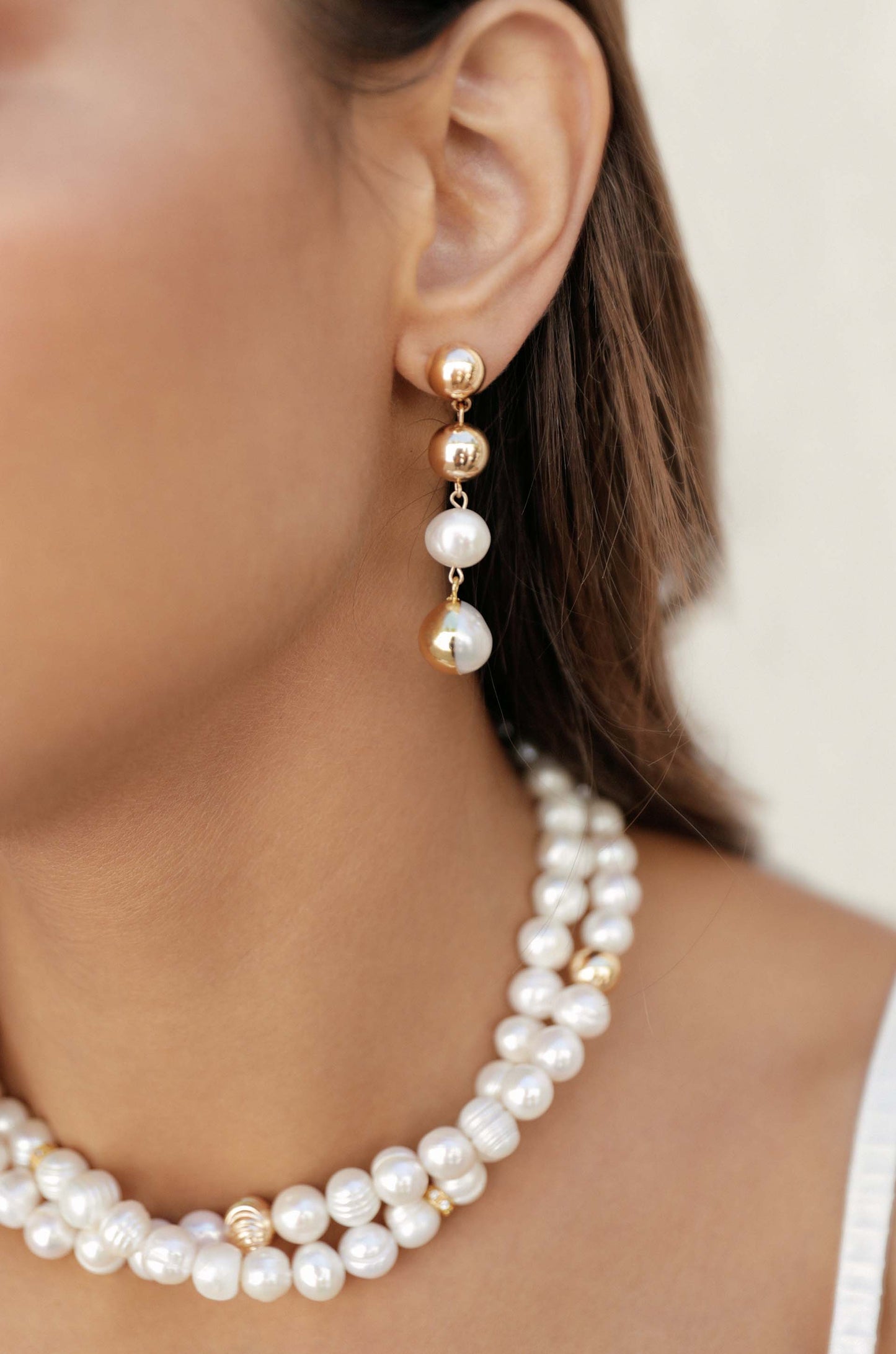Duchess Pearl and 18k Gold Plated Dangle Earrings on model 2