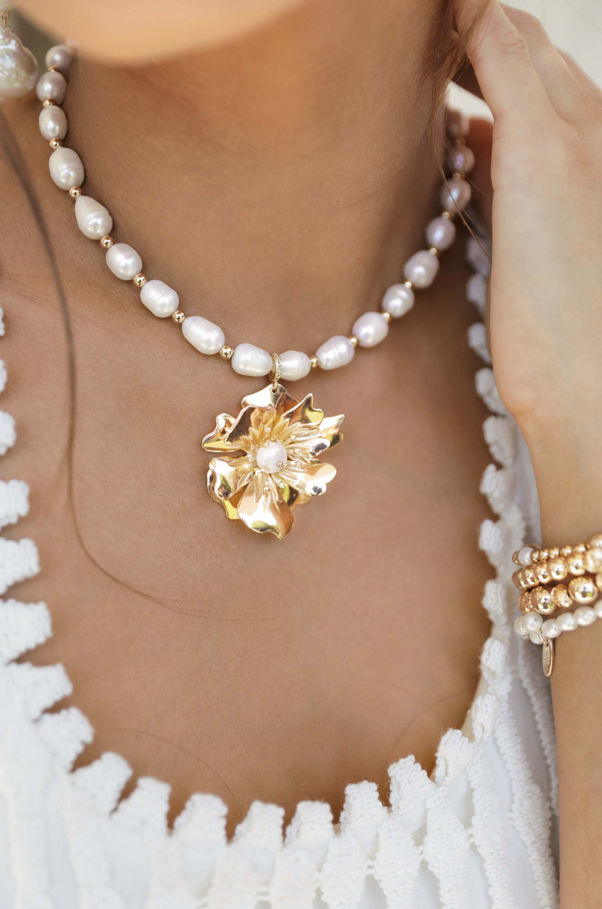 Golden Petals and Pearl Necklace on model