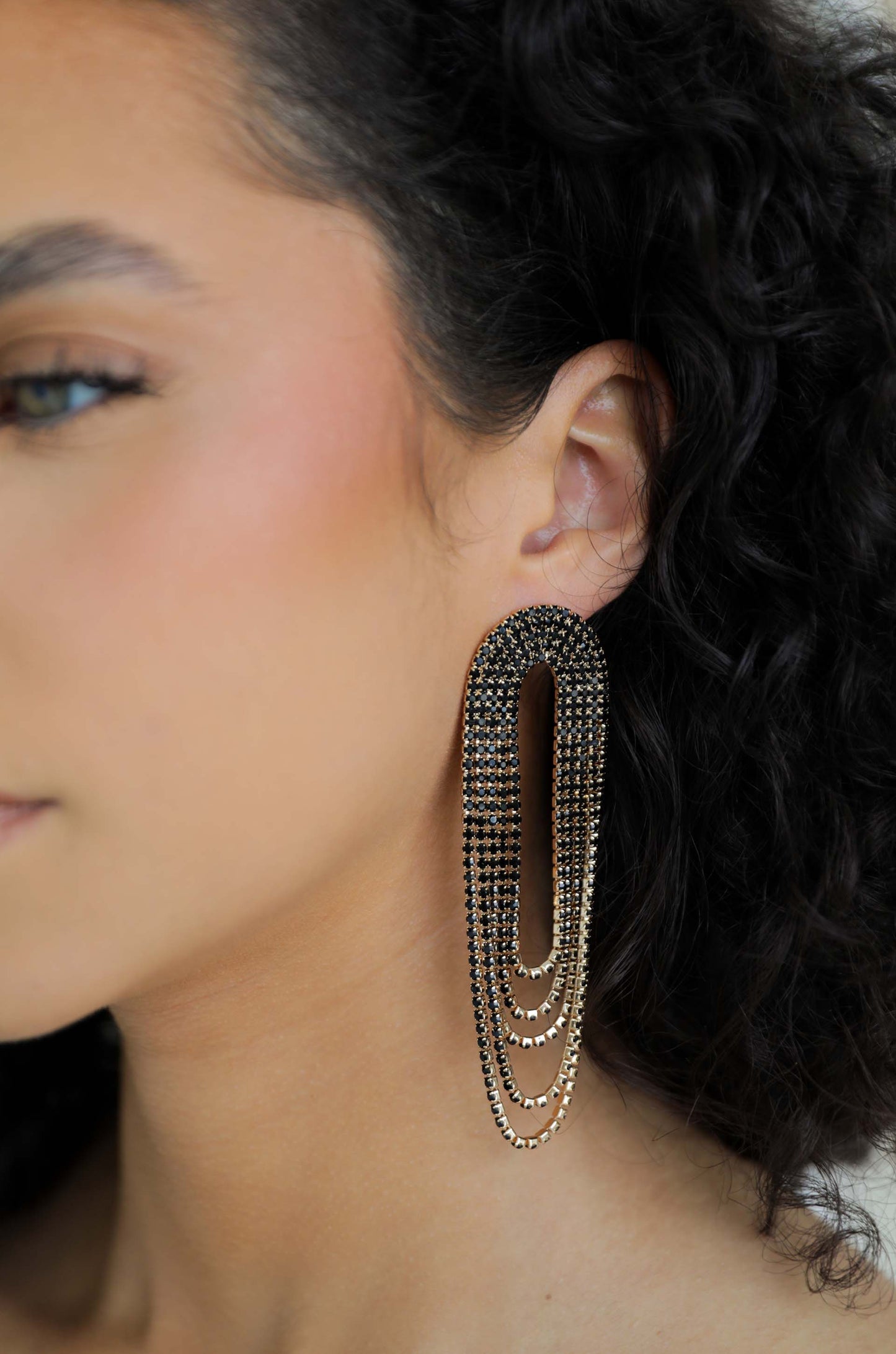 Crystal Drape Fringe Earrings in black on a model