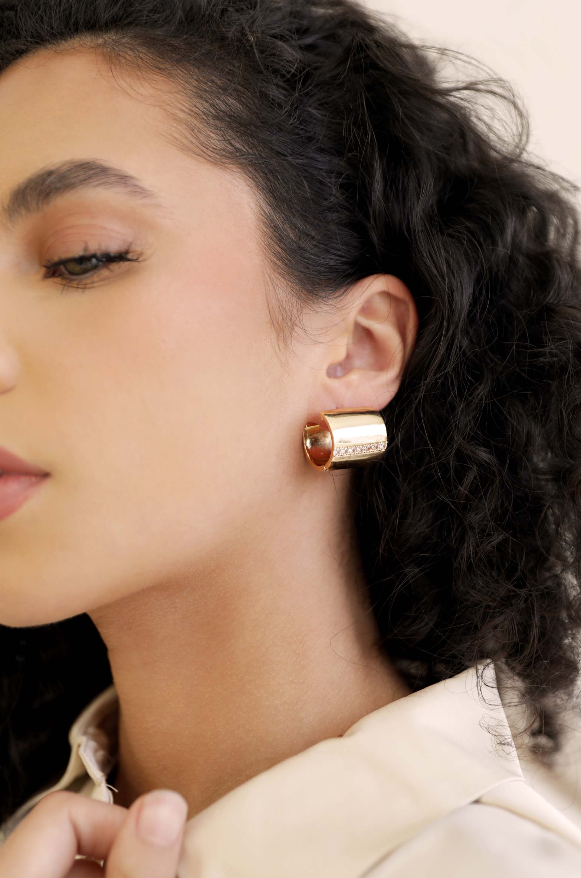 Rolled Up 18k Gold Plated Stud Earrings on model 2