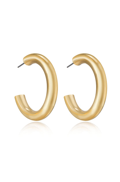 Thick Classic Hoops in medium in gold side view