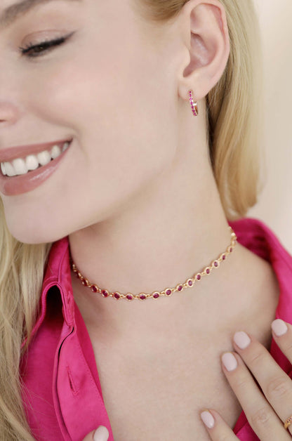 Colorful Crystal 18k Gold Plated Huggie Earrings in ruby on model