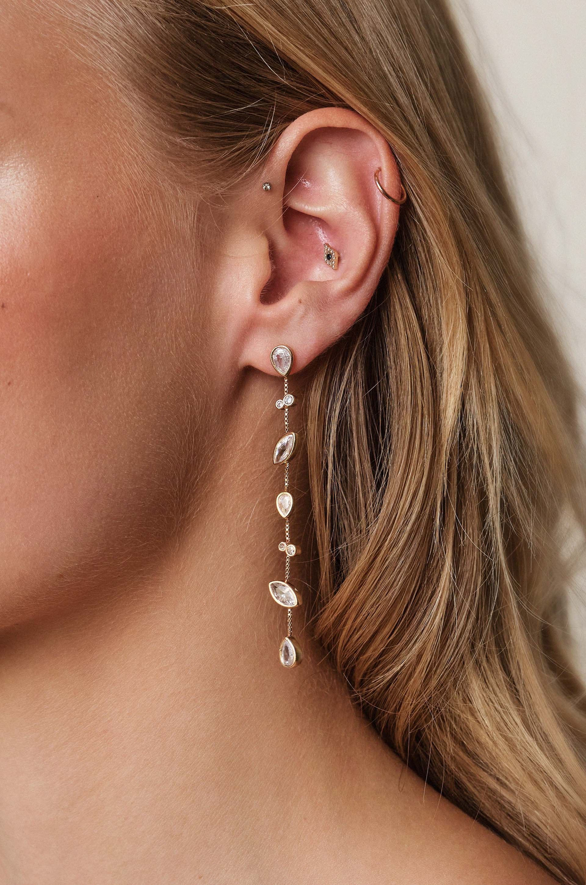 Falling Bezel Crystal Dangle Earrings on model
