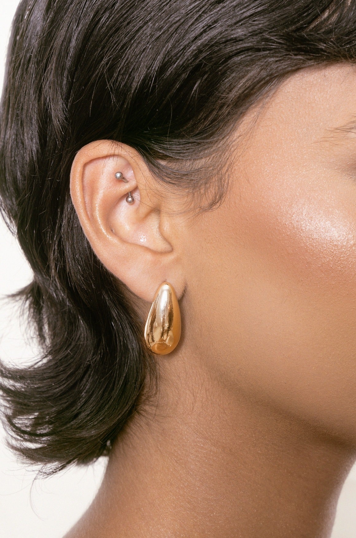 Golden Teardrop Earrings on model