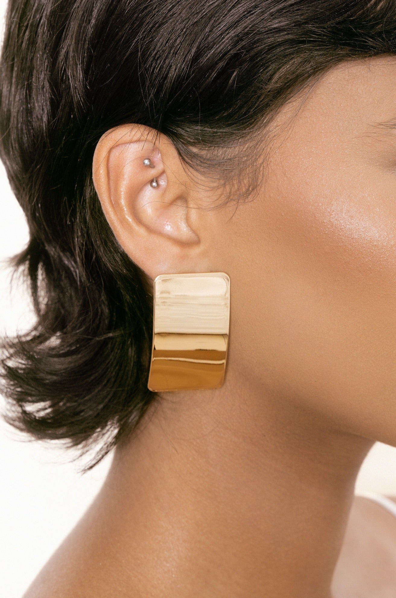 Rectangle Metal Stud Earrings in gold on model