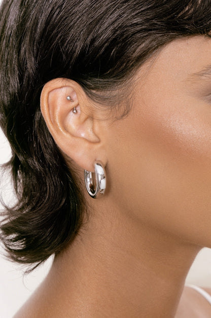 Thick Classic Hoops in small in rhodium on model