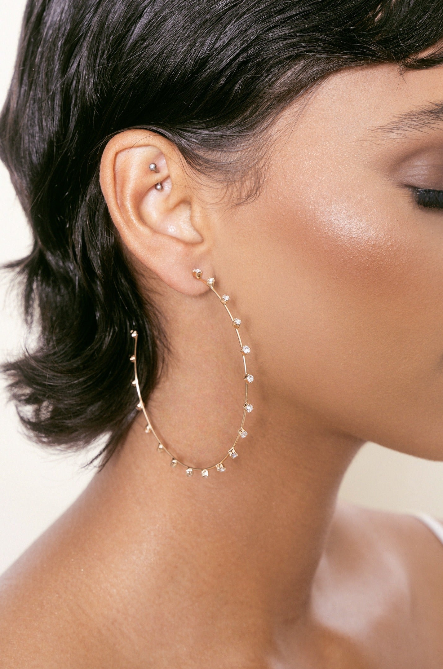 Simple Spark Crystal Hoops in clear on model