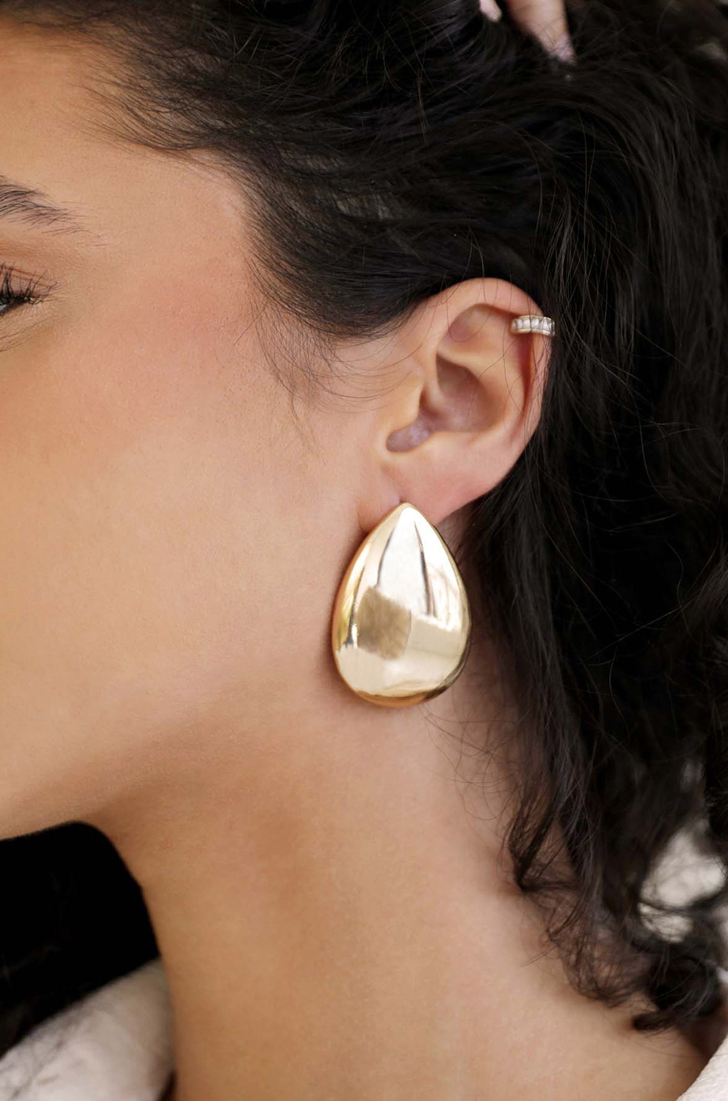 Statement Tear Drop Earrings in gold on model