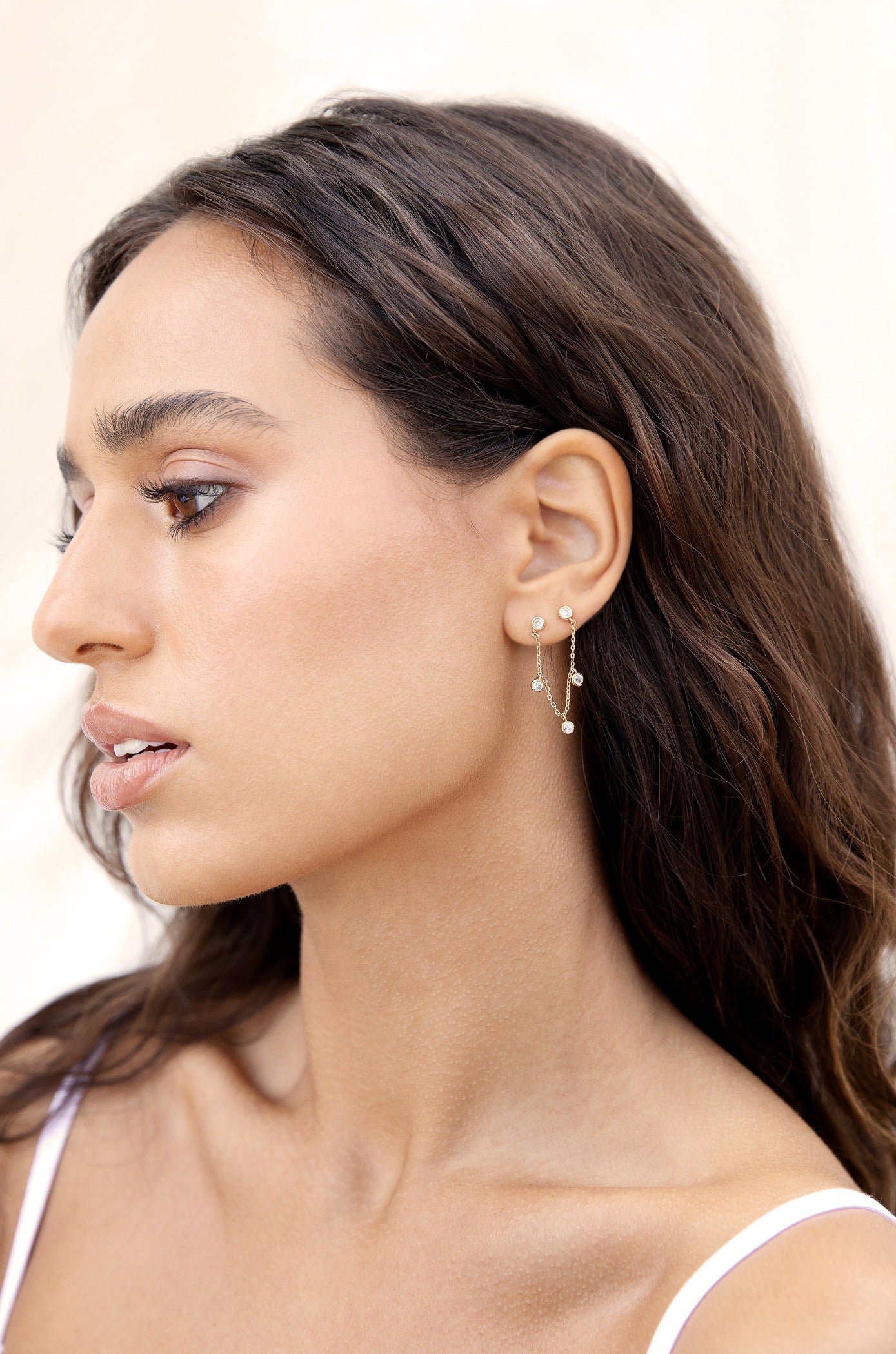 Double Piercing Multi-Crystal 18k Gold Plated Dangle Earrings on model 2