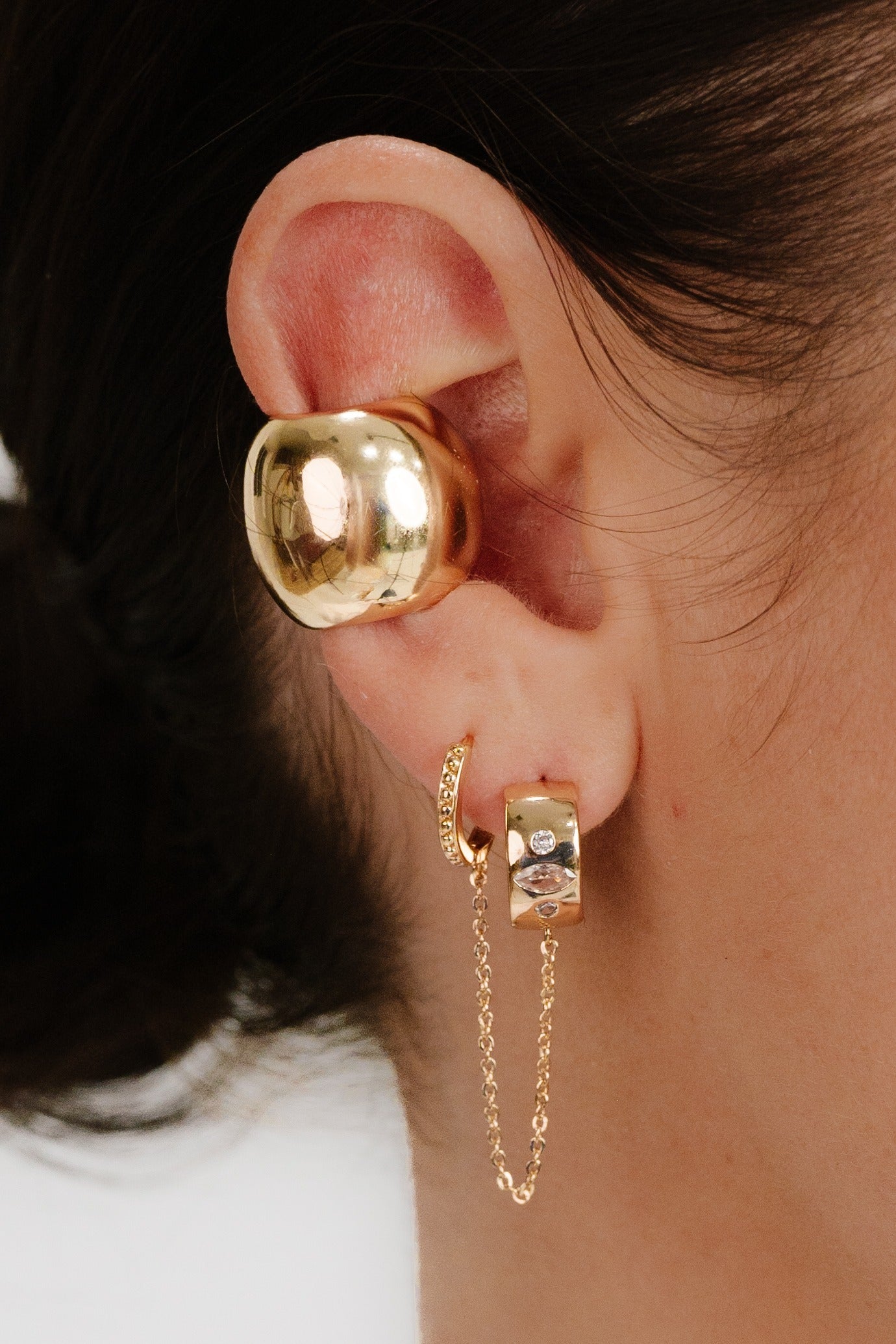Double Piercing Bezel Crystal Dangle Earrings on model