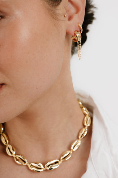 Double Piercing Bezel Crystal Dangle Earrings on model 3