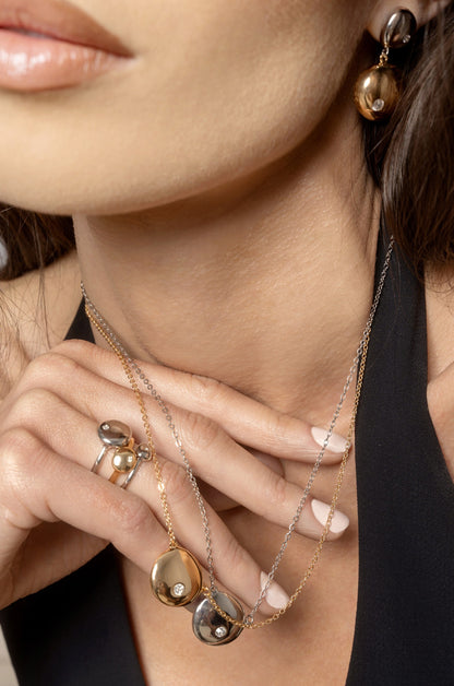 Polished Pebble Pendant Necklace on model 2