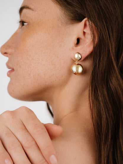 Polished Double Pebble Drop Earrings on model 2