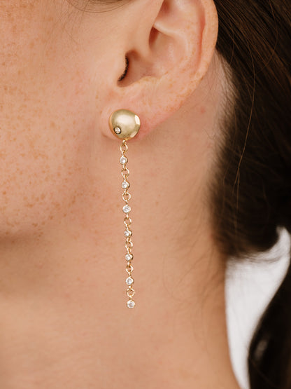 Polished Pebble Linear Crystal Chain Drop Earrings on model