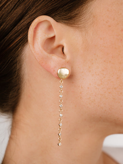 Polished Pebble Linear Crystal Chain Drop Earrings on model 2