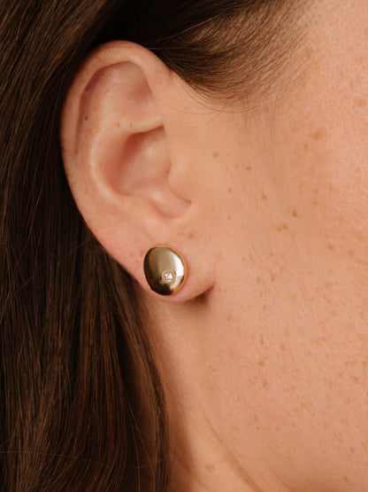 Polished Pebble Single Crystal Stud Earrings on model