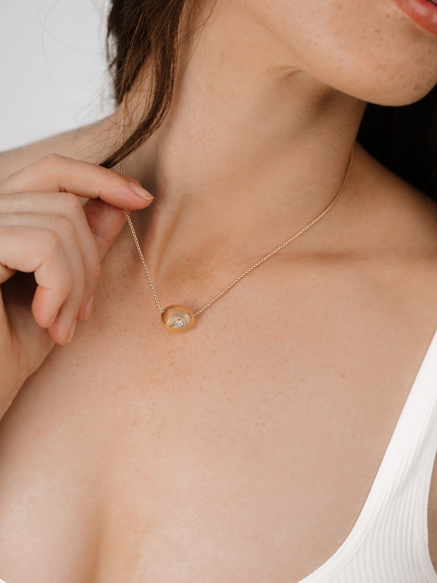 Crystal Dot Pebble Pendant Necklace on model 6