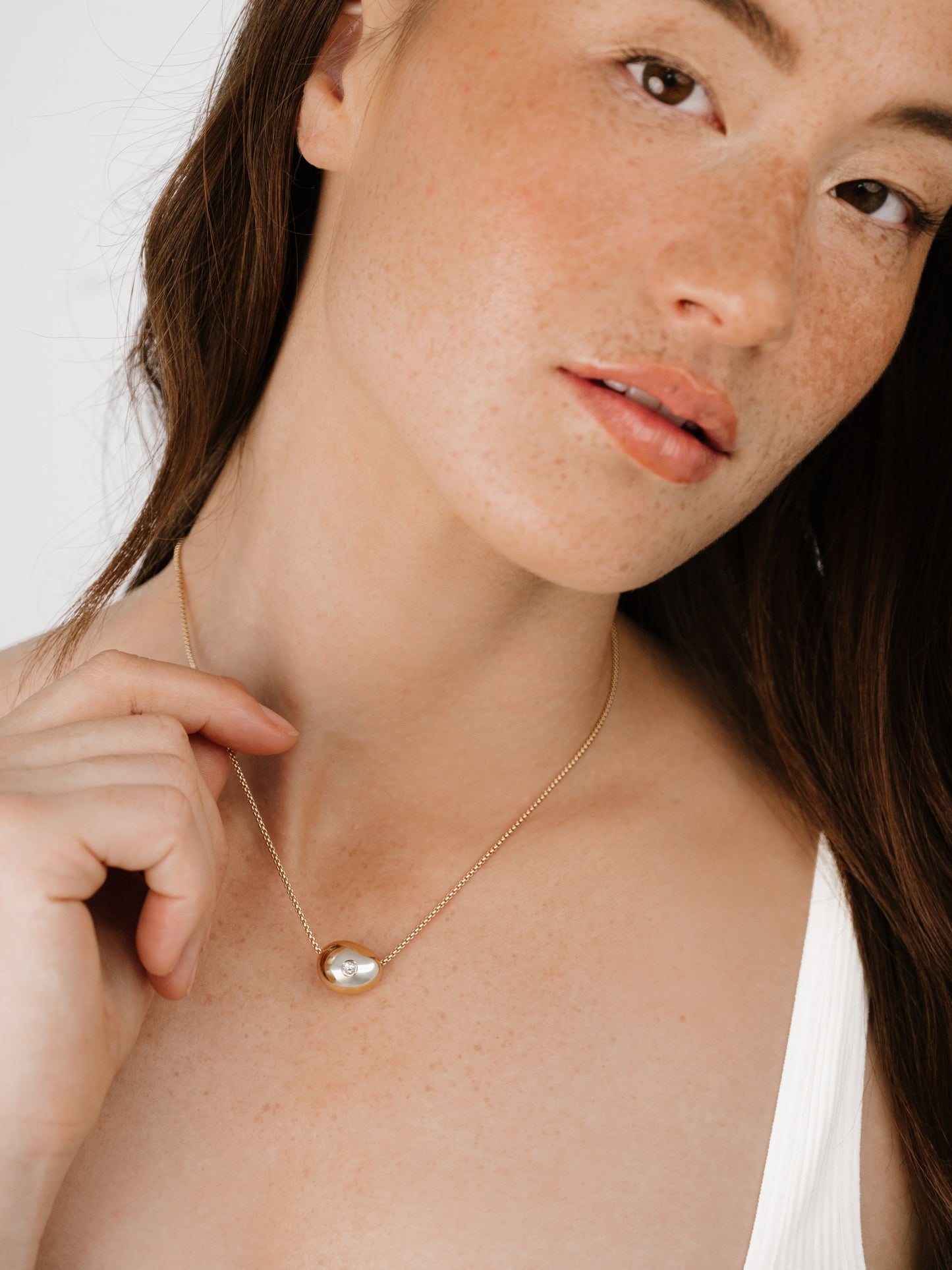 Crystal Dot Pebble Pendant Necklace on model 8