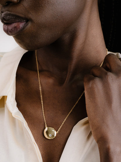Polished Pebble Pendant Necklace on model 