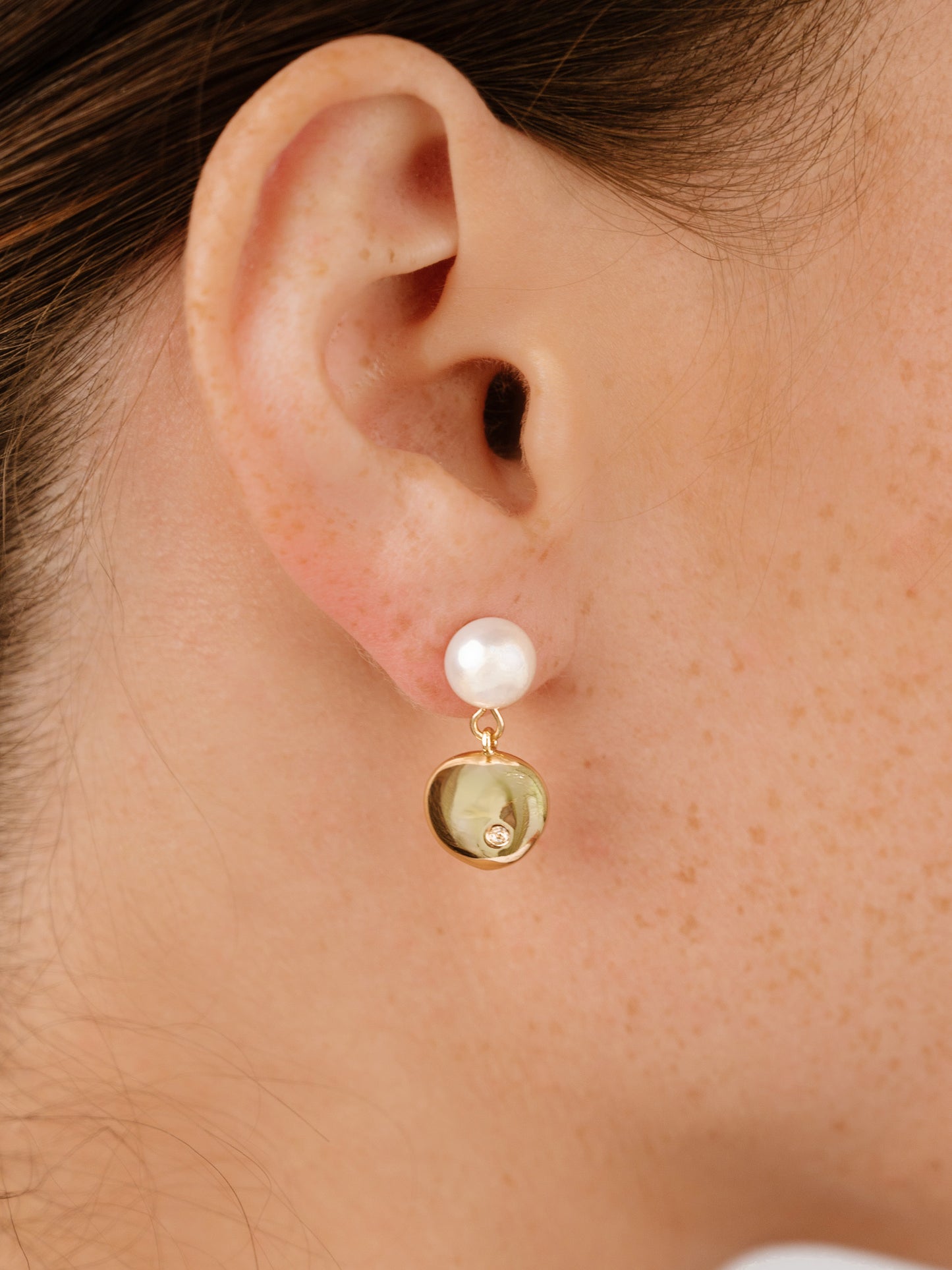 Small Pebble and Pearl Dangle Earrings on model