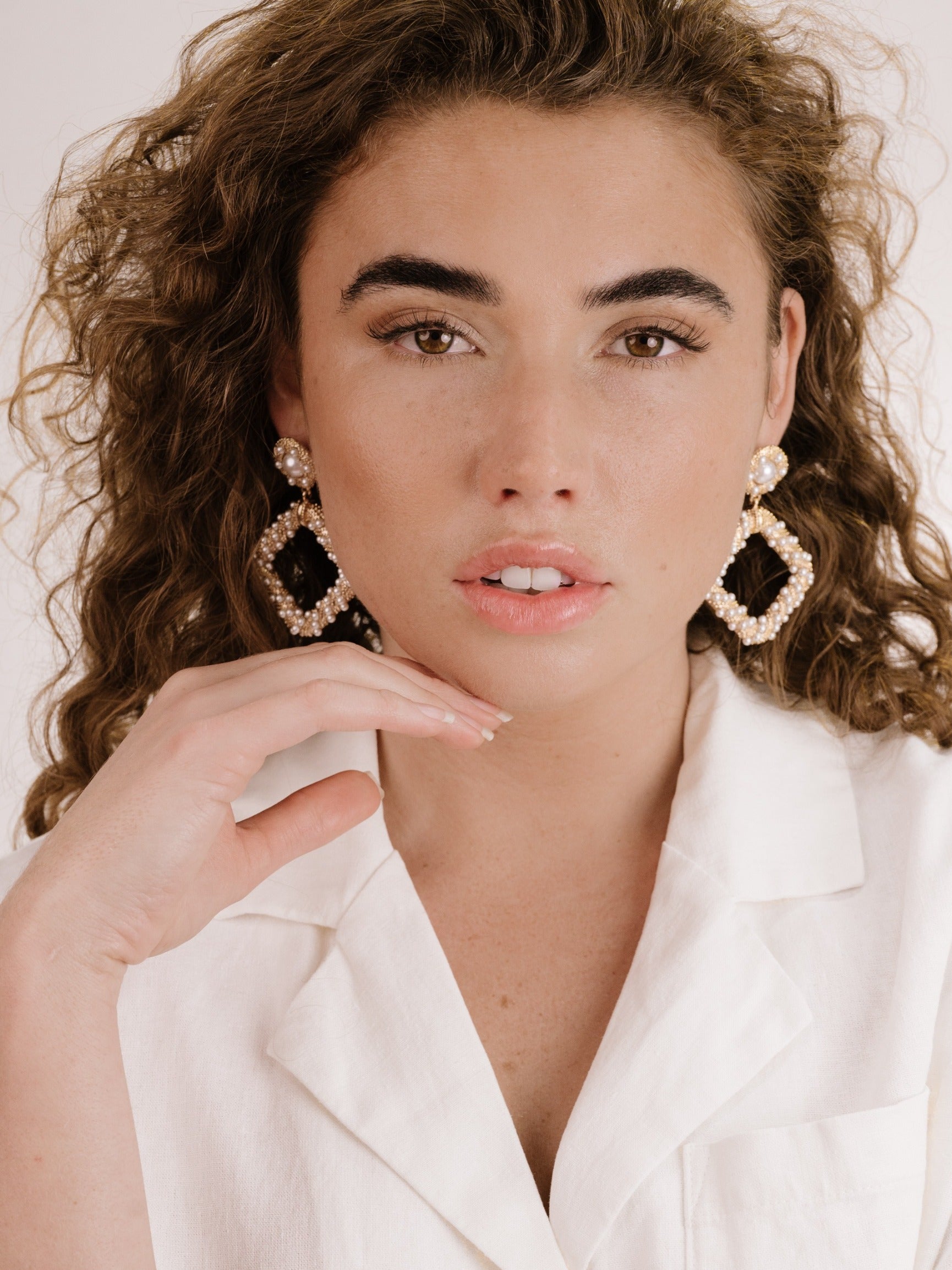 Pearl Knocker Earrings on model 5