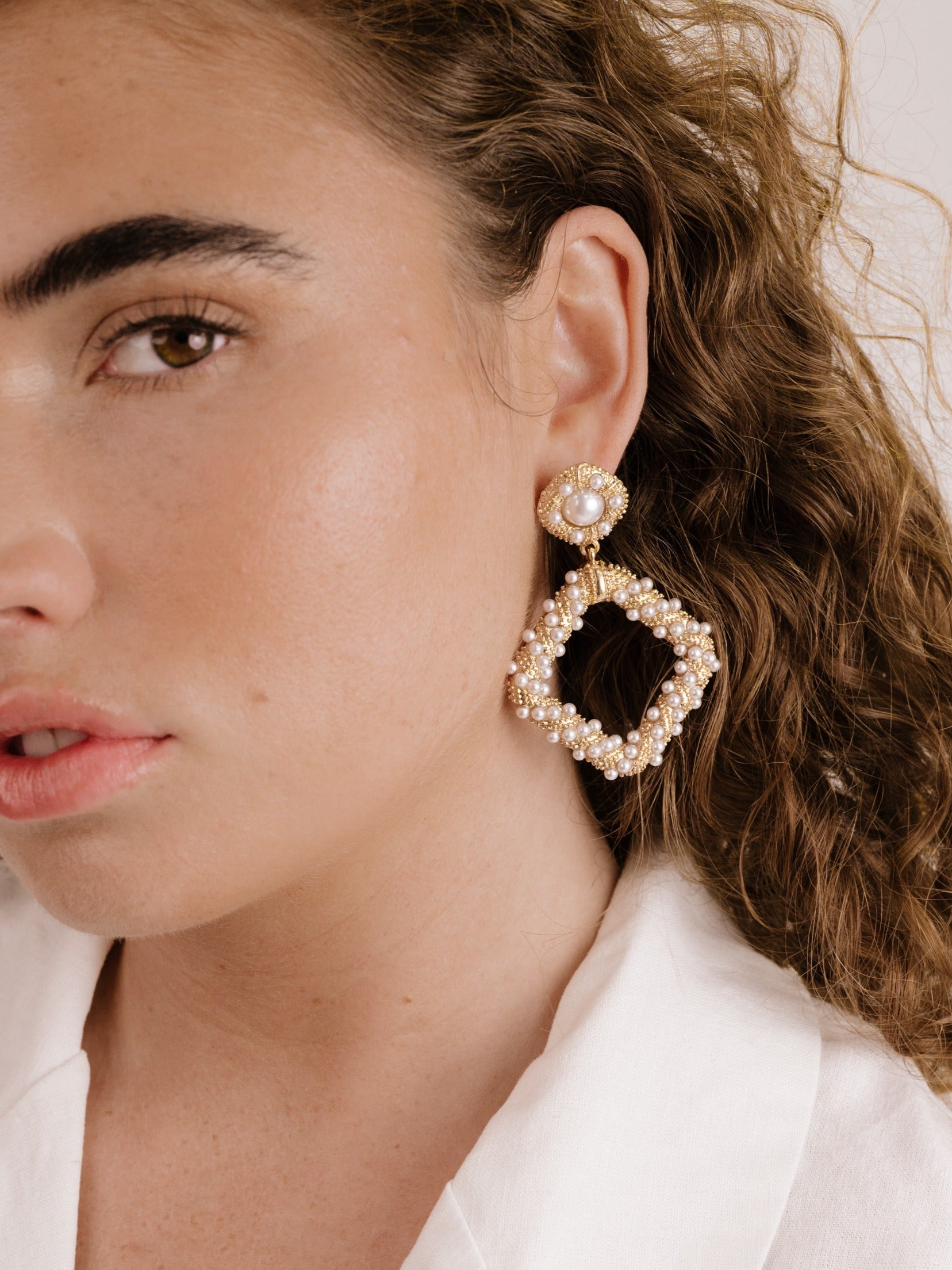 Pearl Knocker Earrings on model 2