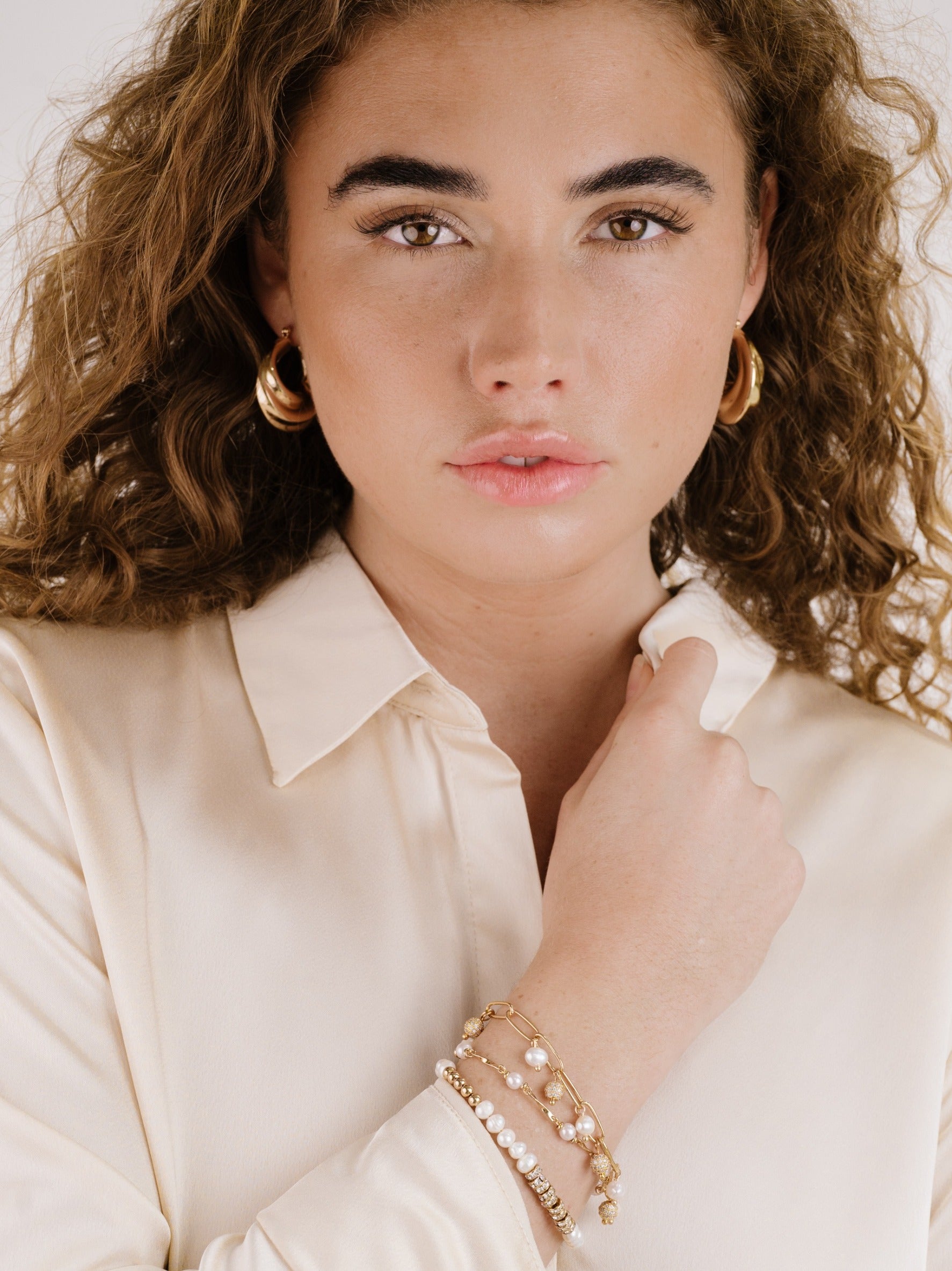 Crescent Swirl Hoop Earrings on model 5