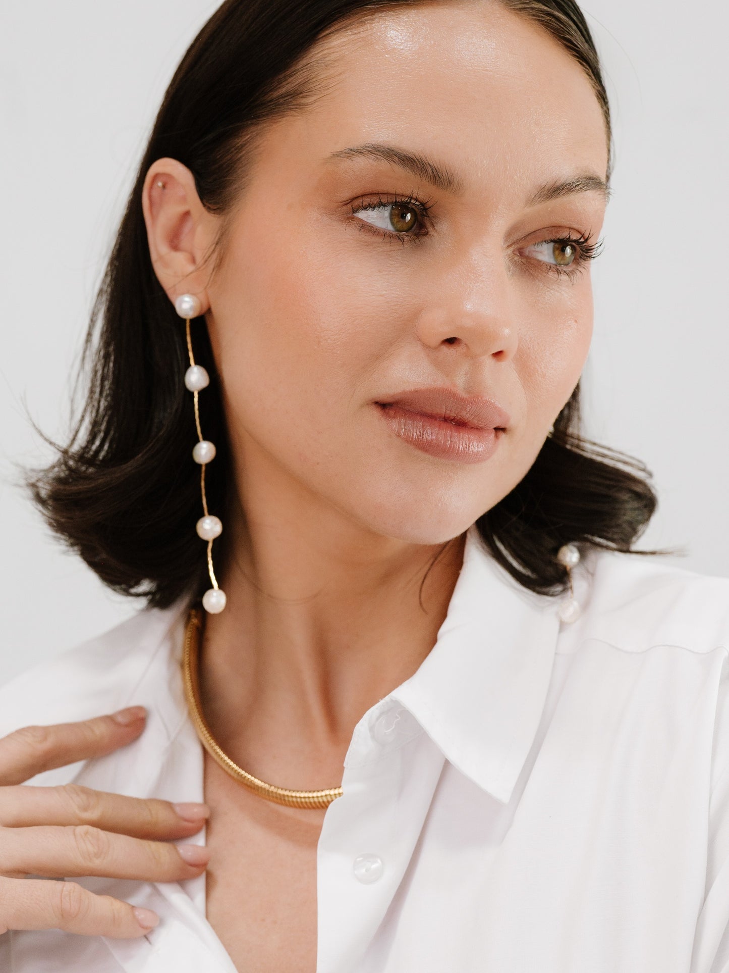 Dripping Pearl Delicate Drop Earrings on model