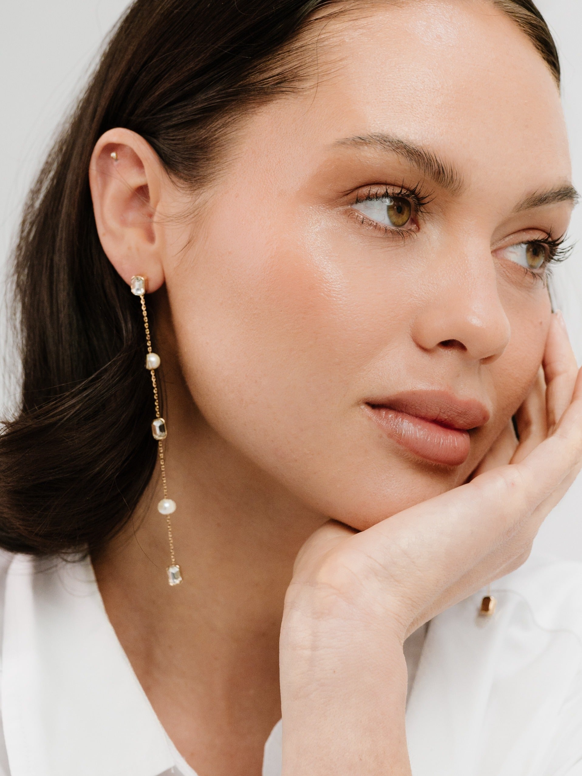 Pearl and Crystal Linear Drop Earrings on model 2