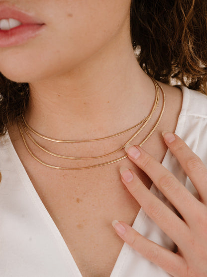 Triple Flex Snake Chain Layered Necklace on model 3
