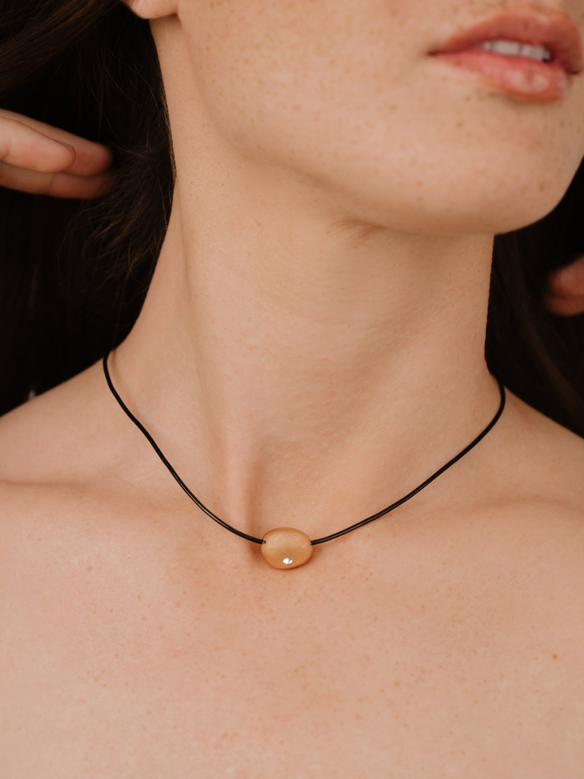 Single Crystal Polished Pebble Leather Pendant Necklace on model 6