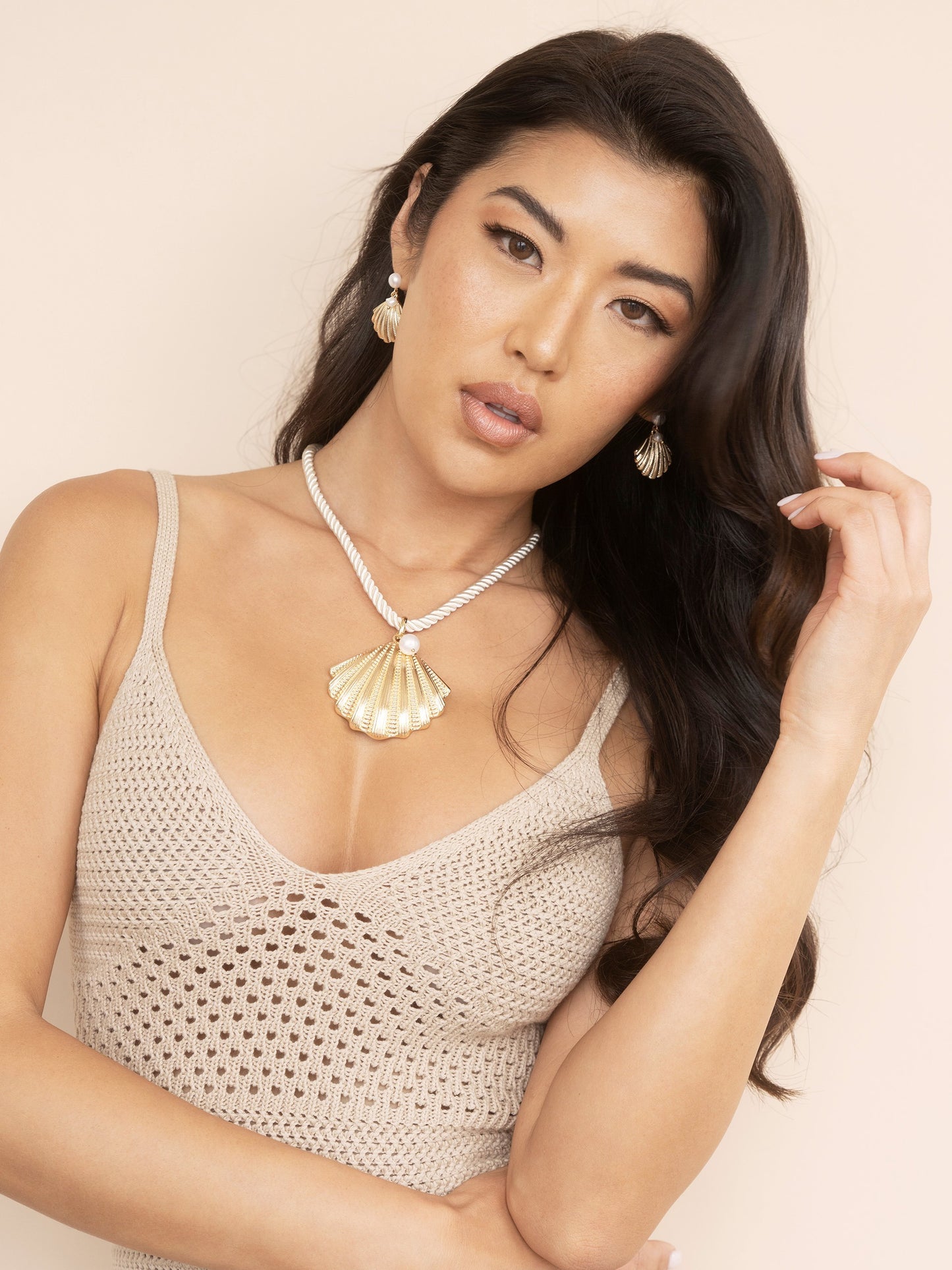 Scallop Shell and Pearl Earrings on model 4
