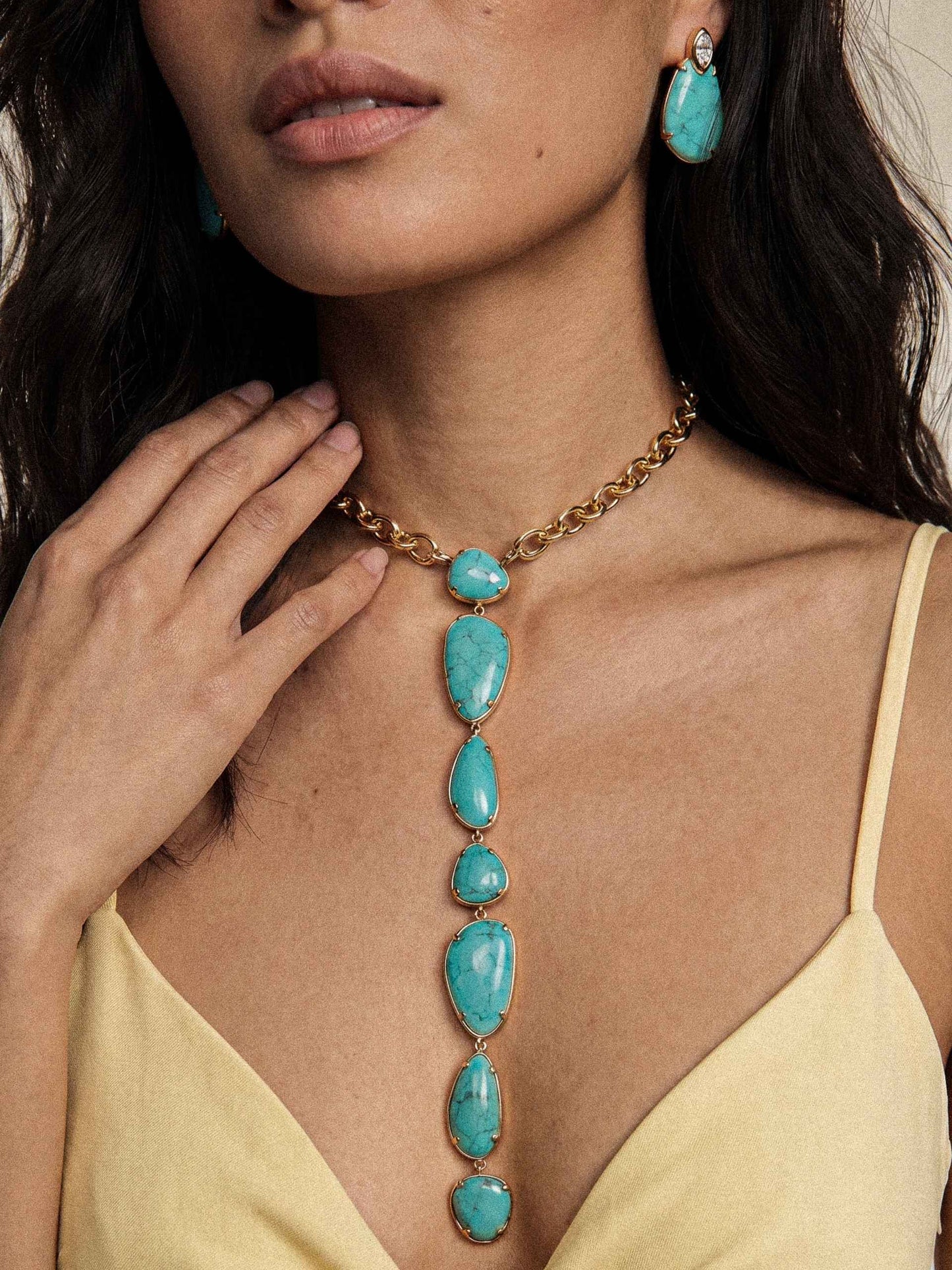 majestic stone turquoise lariat with earrings on model