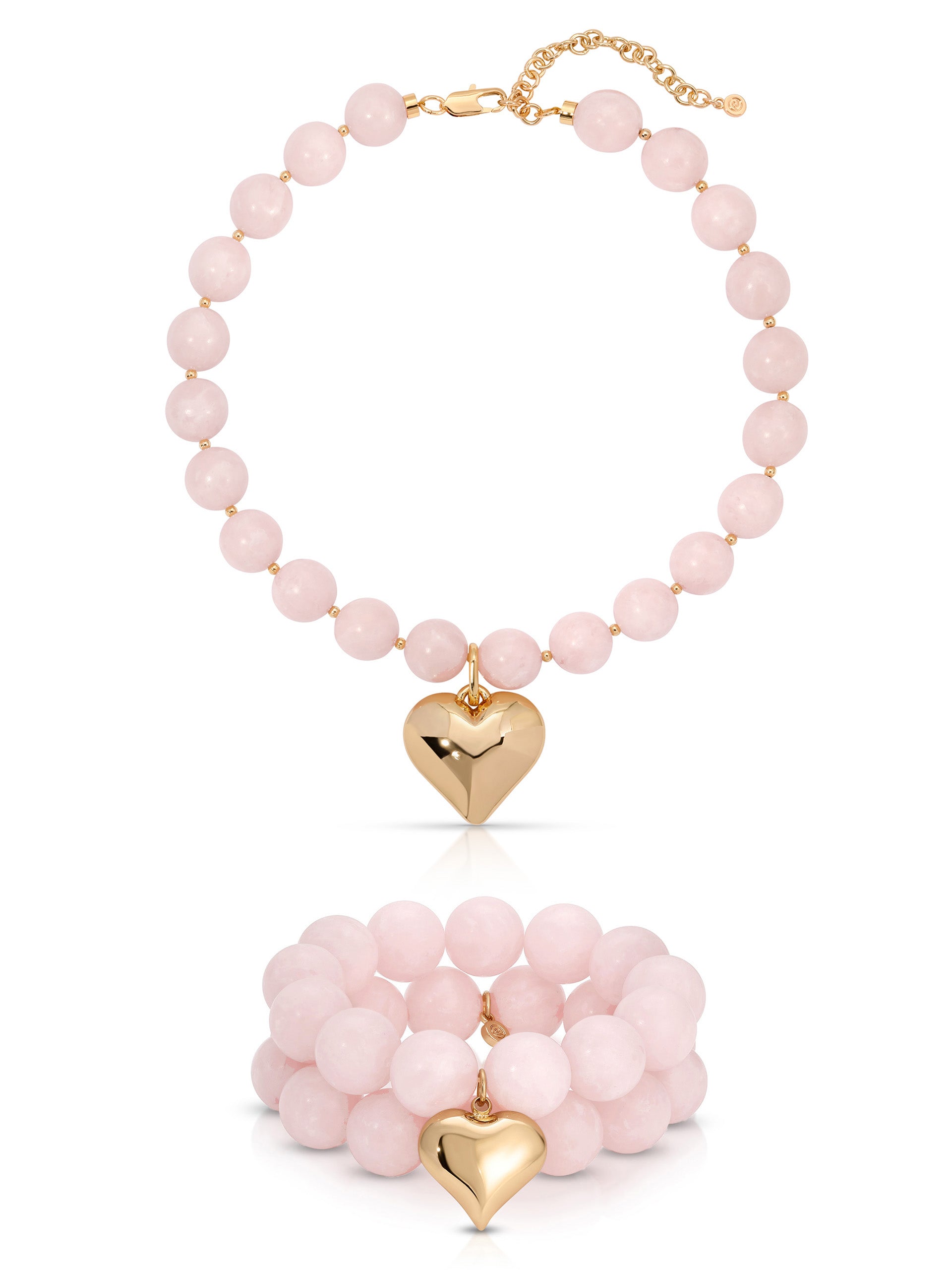 Pink beaded necklace with gold heart pendants on a white background