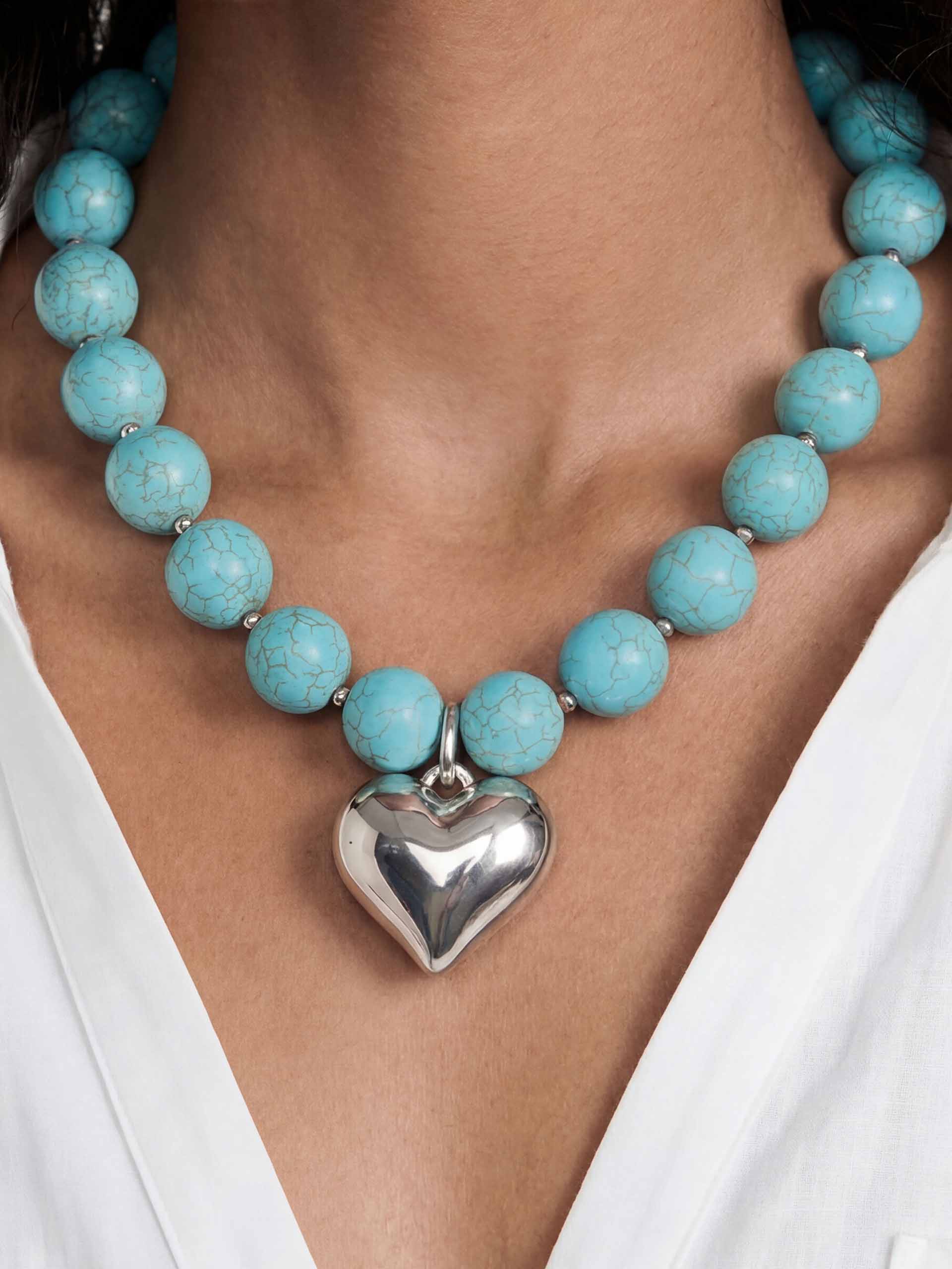 Luck and Love Turquoise Heart Necklace Turquoise with Silver Plating on model 1