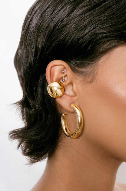 Thick Medium Hoops (1.5") and Chunky Cuff Set in gold on model