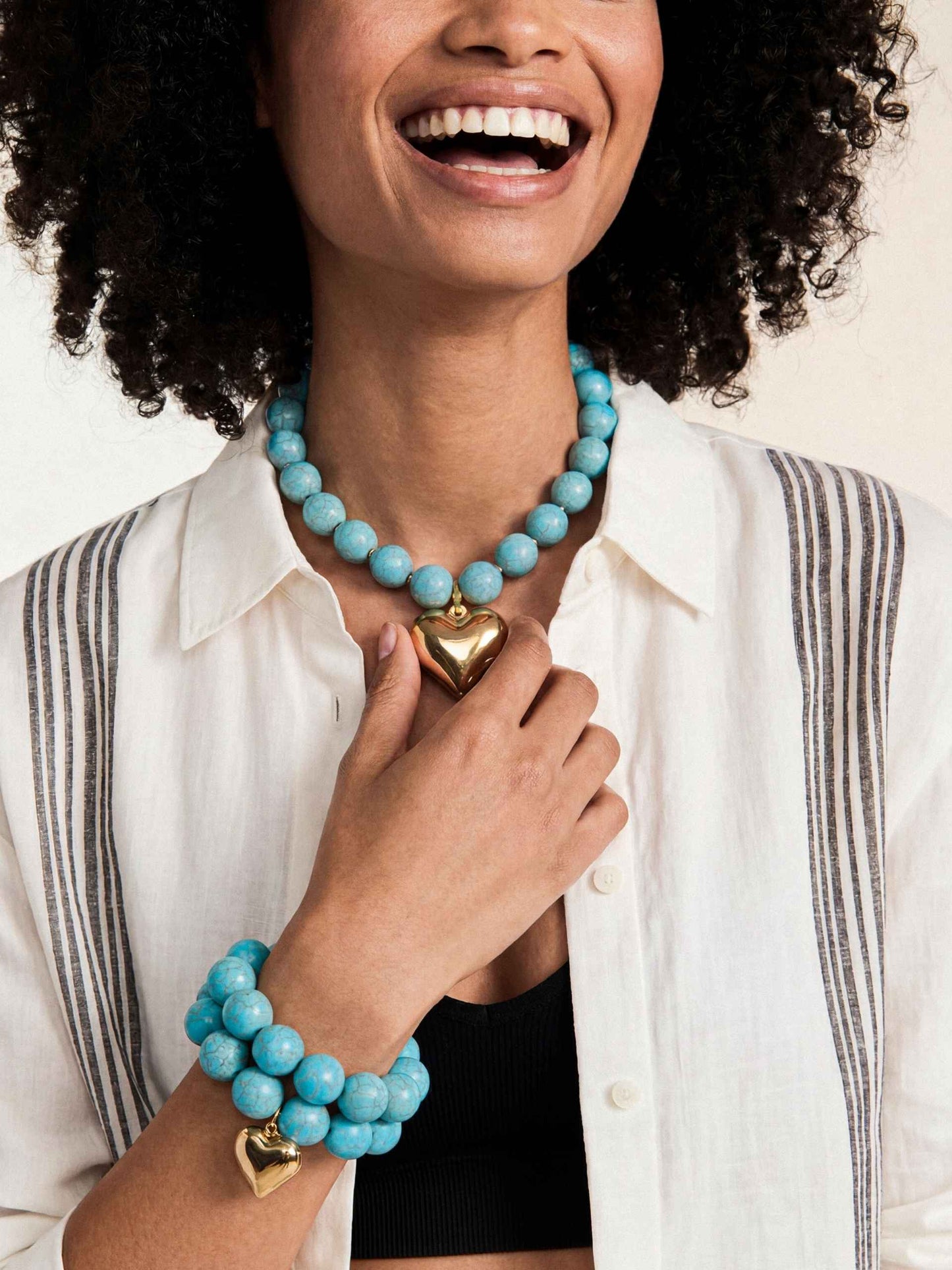 Luck and Love Turquoise Heart Necklace Turquoise with 18k Gold Plating on model 4