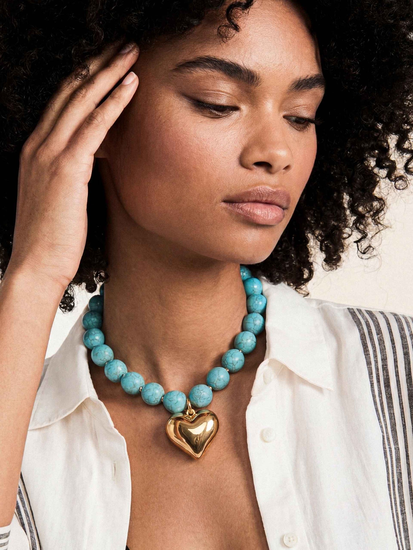 Luck and Love Turquoise Heart Necklace Turquoise with 18k Gold Plating on model