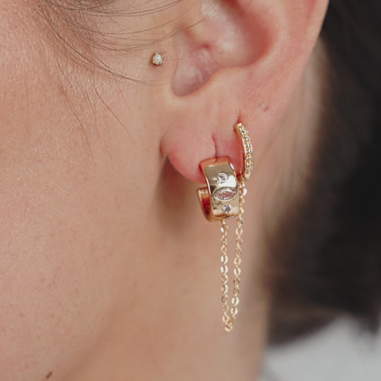 Double Piercing Bezel Crystal Dangle Earrings on model in video