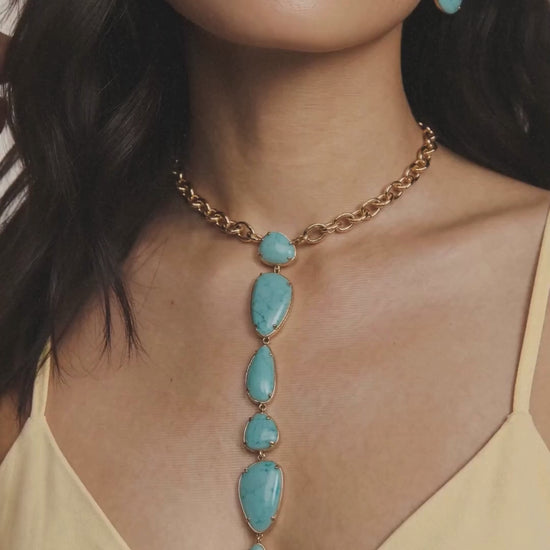majestic stone turquoise lariat with earrings on model