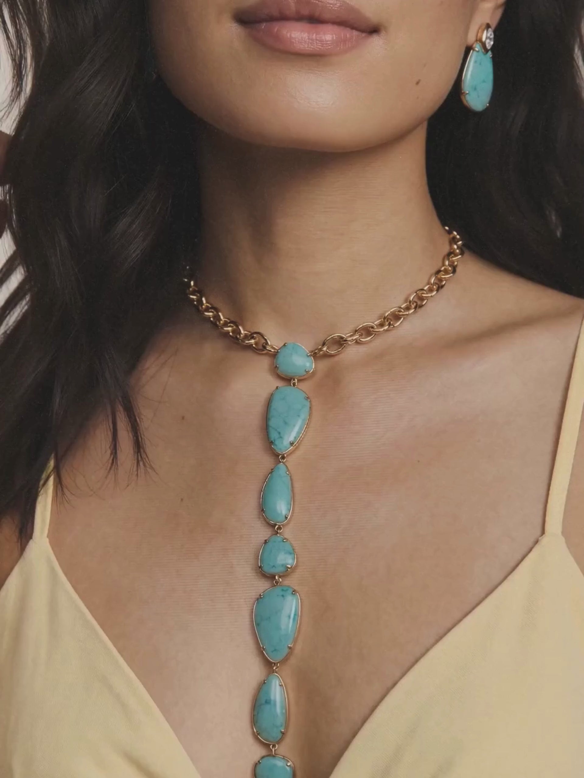 majestic stone turquoise lariat with earrings on model
