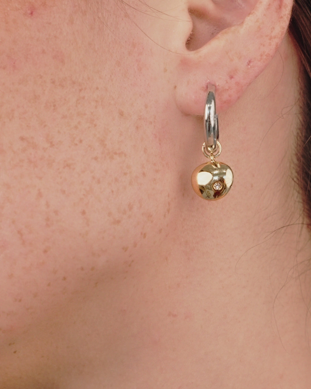 Polished Pebble Huggie Hoop Earrings in video