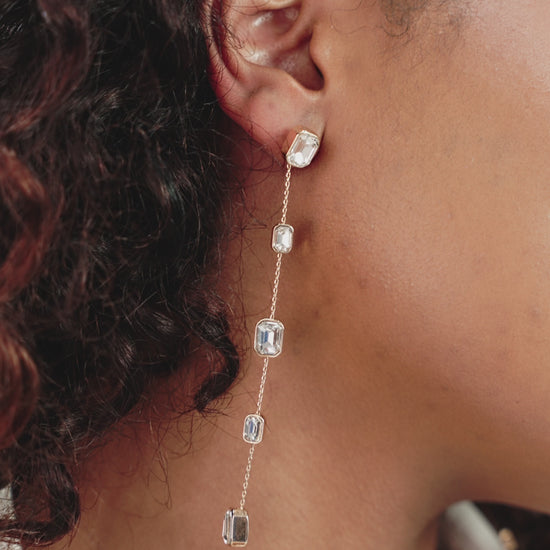 Iconic Crystal Dangle Earrings on model in video