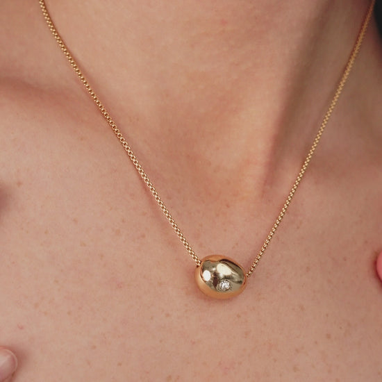 Crystal Dot Pebble Pendant Necklace on model in video