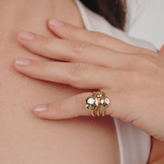 Polished Stacking Pebble Ring Set in gold in video