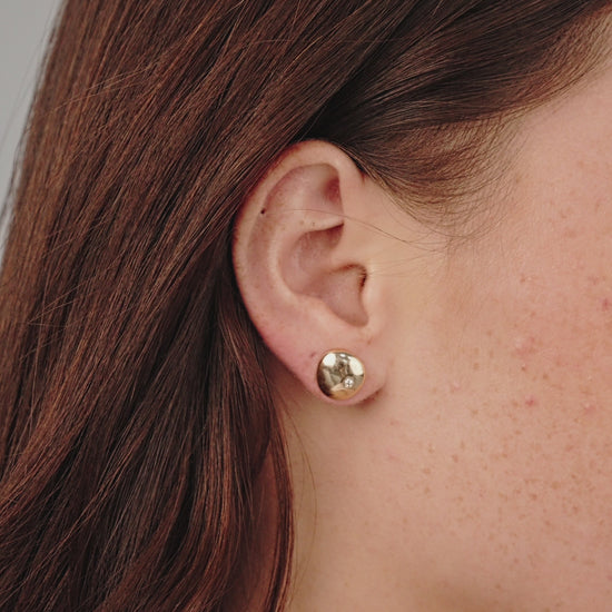 Polished Pebble Single Crystal Stud Earrings in gold model in video